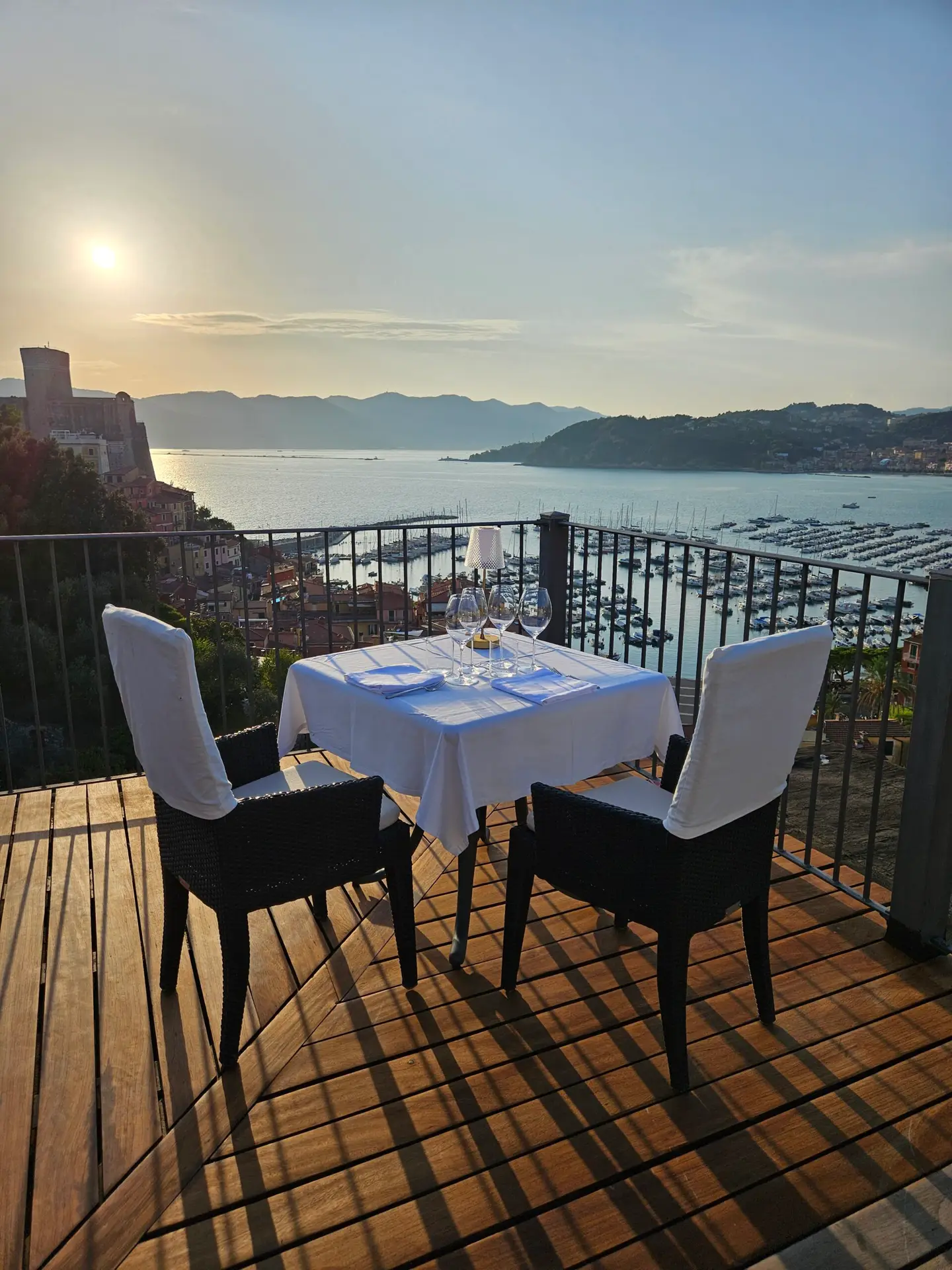 Private dinner table set up on the terrace overlooking The Poet's Gulf