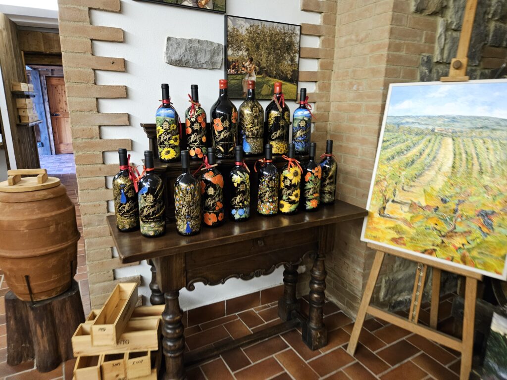 Hand painted wine bottles at Tenuta Casanova in Tuscany