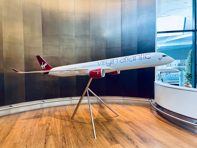 Photo of a red and white model Virgin Atlantic plane