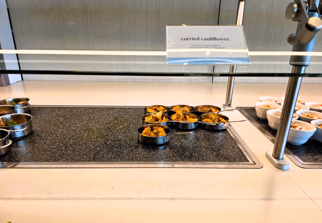 Curried Cauliflower dish offered at the Capital One Denver Airport Lounge