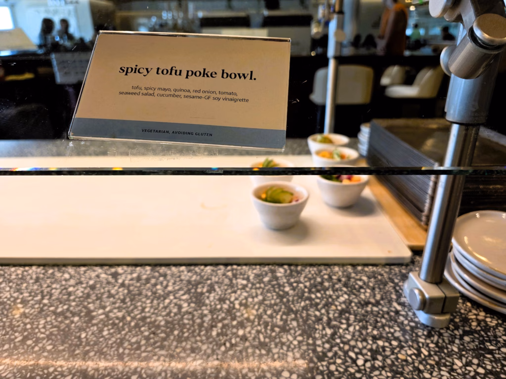 Spicy Tofu Poke Bowl at the Capital One Lounge buffet in Denver Airport.