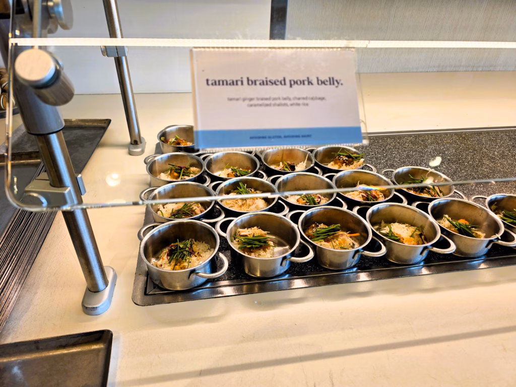 Tamari braised pork belly served at the Denver Capital One Lounge buffet