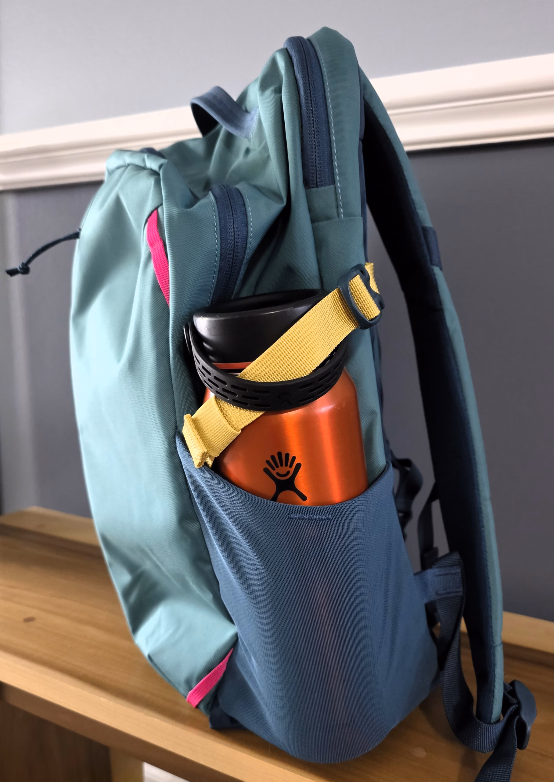 Hydro Flask 32 oz insulated leak proof water bottle in a Patagonia travel bookbag