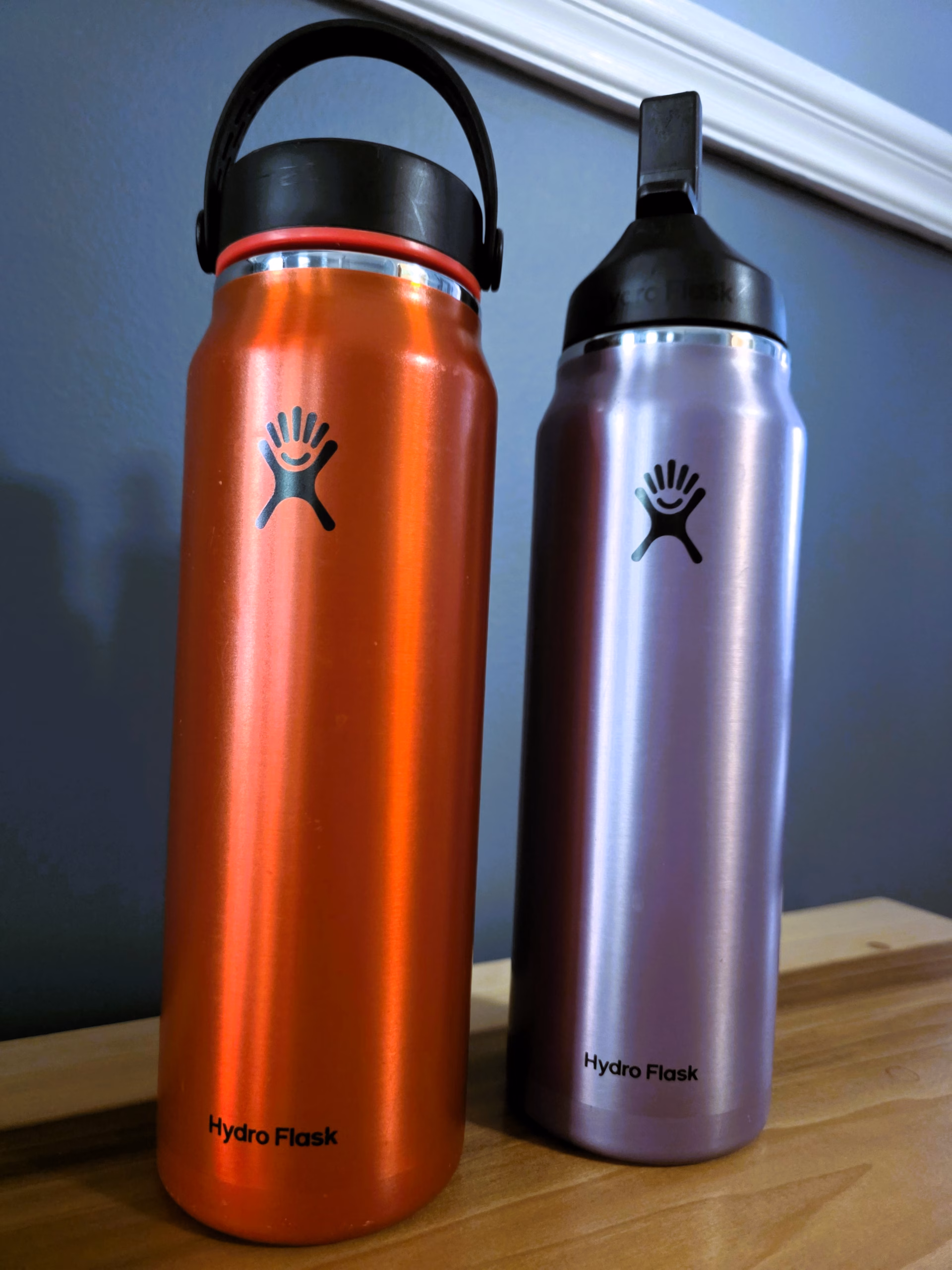 Hydro Flask 32 oz insulated leak proof water bottles, wide mouth lid and wide mouth lid with straw.
