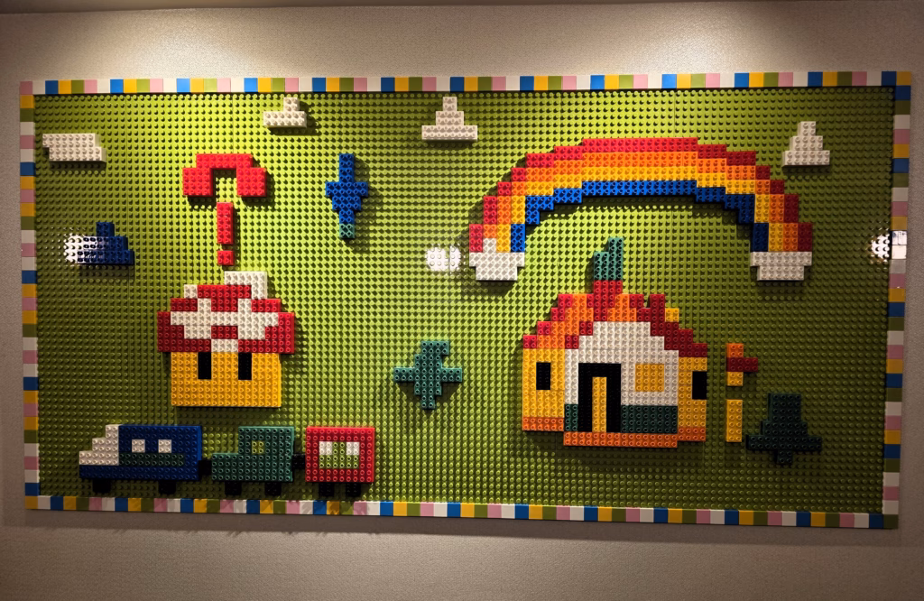 Colorful Lego wall installation on the Level Up fifteenth floor at The Curtis Hotel Denver.