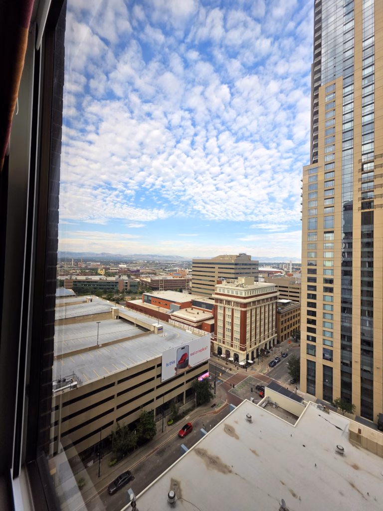 Scenic city and mountain views from a 16th-floor room at The Curtis Denver.