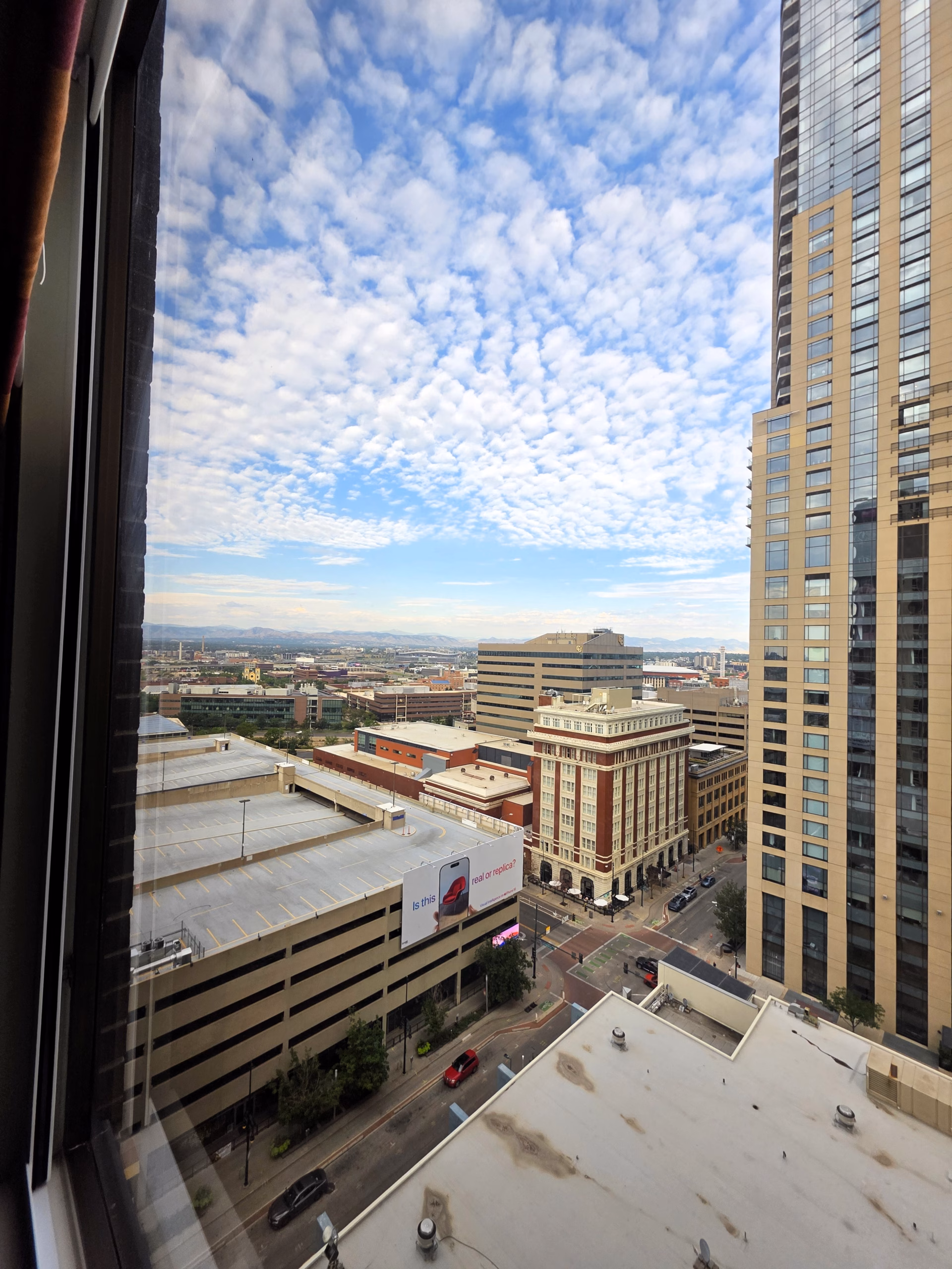Scenic city and mountain views from a 16th-floor room at The Curtis Denver.