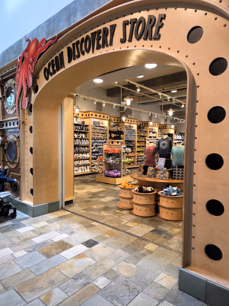 Monterey Bay Aquarium gift shop with plush sea otters and apparel