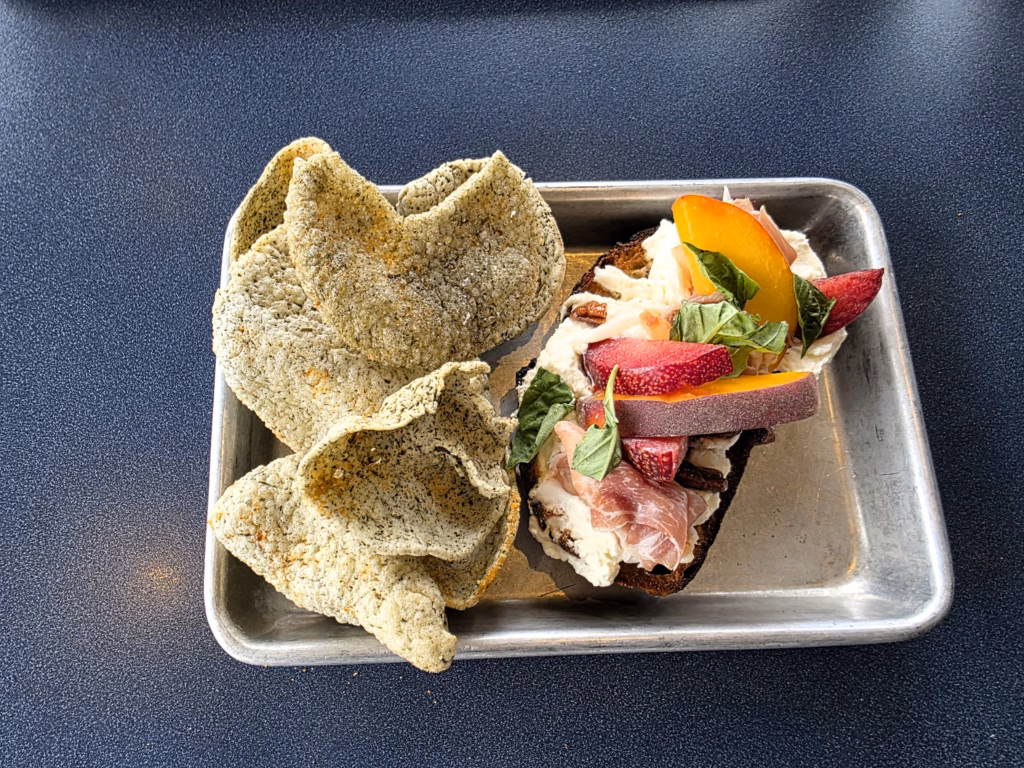 Prosciutto and burrata with kelp chips from the aquarium café