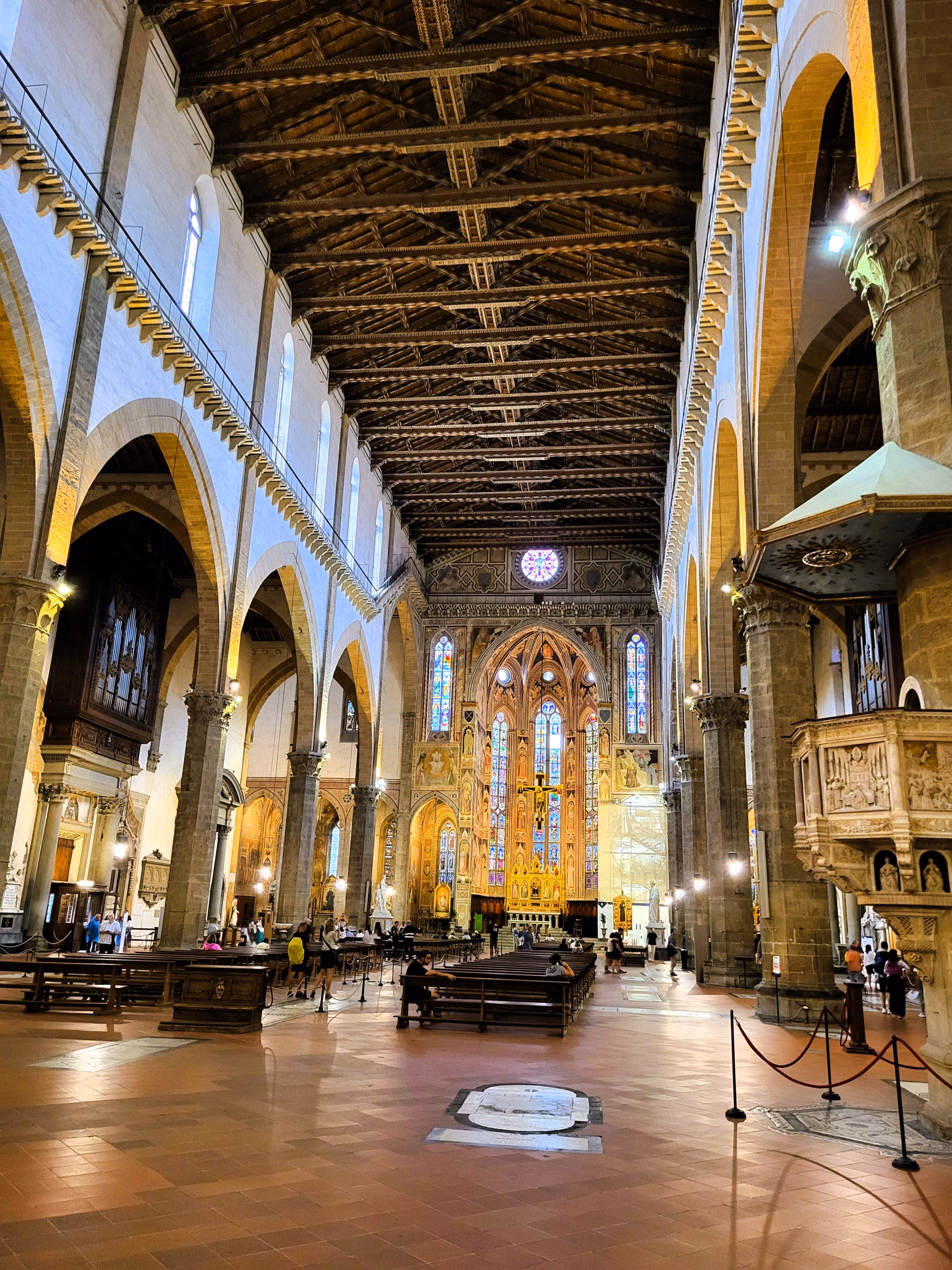 inside view of basilica santa croce floor, pews, and decor