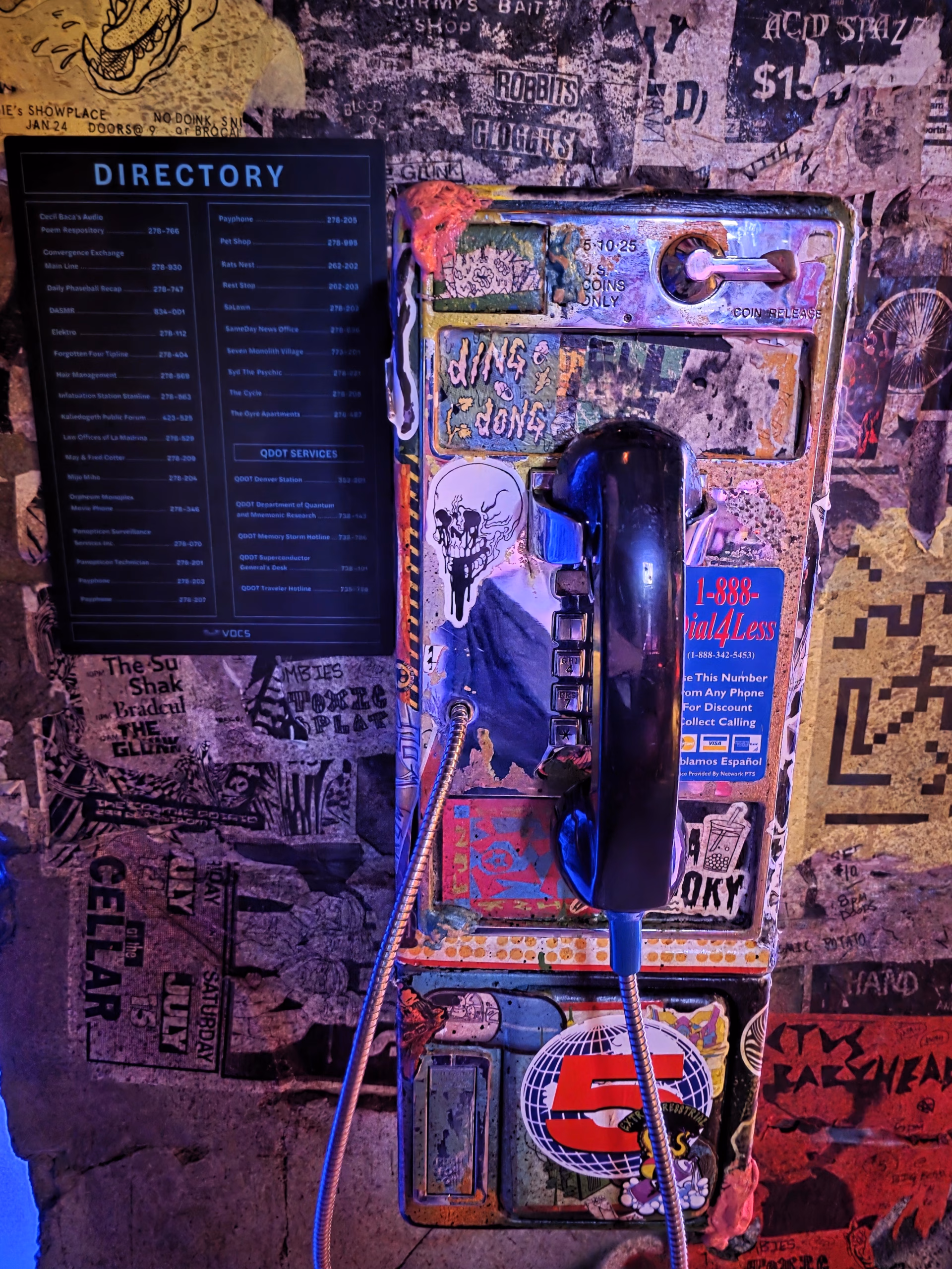 working free payphone with comic graphiti at meow wolf denver